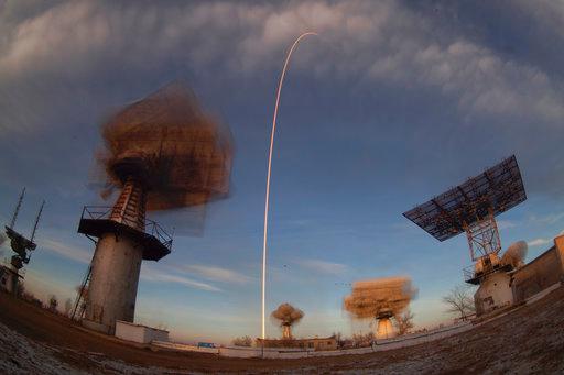 In this photo taken with a long exposure, a Soyuz rocket carrying a new crew to the International Space Station blasts off from the Russian-leased Baikonur cosmodrome in Kazakhstan, Monday, Dec. 3, 2018. The Russian rocket carries U.S. astronaut Anne McClain, Russian cosmonaut Oleg Kononenko‎ and CSA astronaut David Saint Jacques. [Photo: AP/Dmitri Lovetsky]